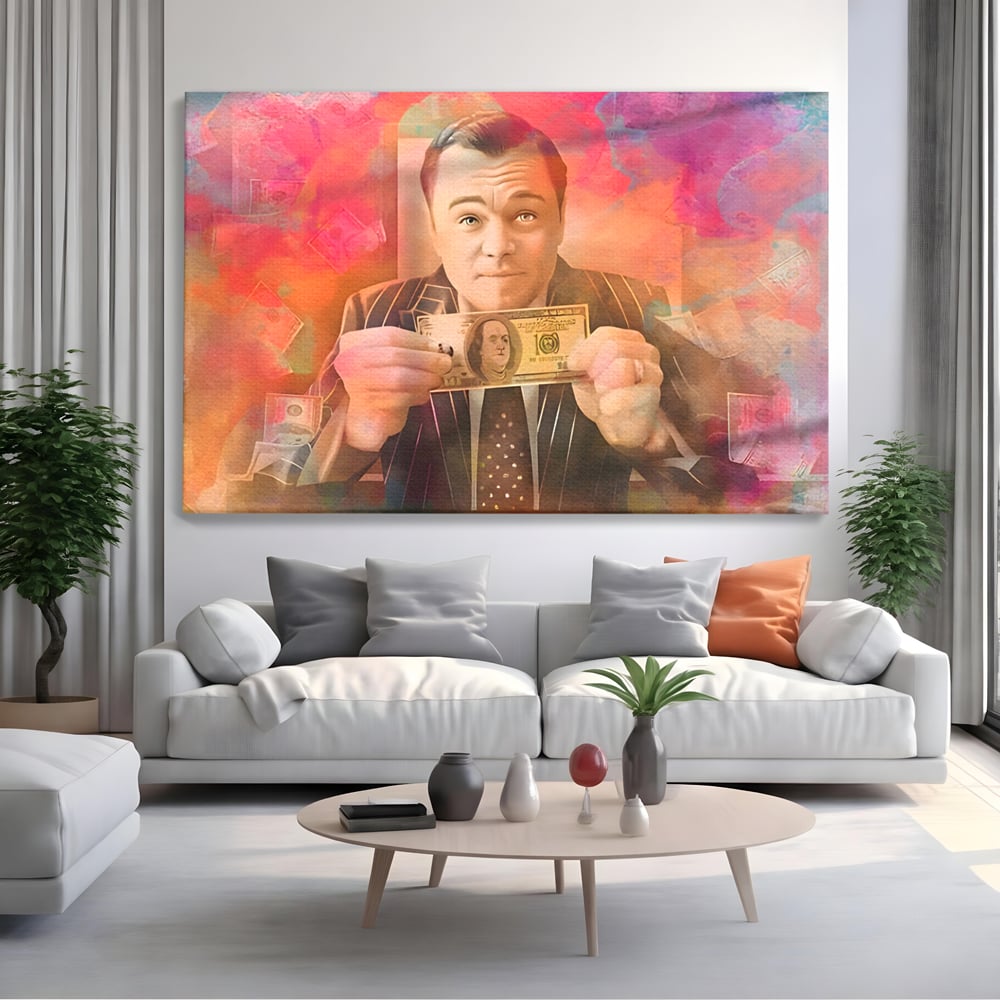 Tablou canvas cu tablou cu actorul leonardo dicaprio tinand bani, fara rama, pe sasiu de lemn, pe perete intr-un living